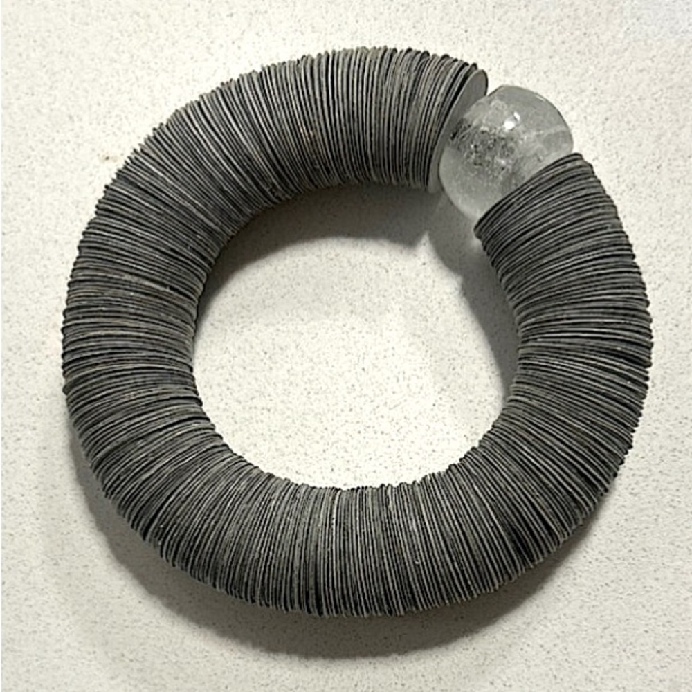 One-of-a-kind “paper disc” bracelet from Montmartre, Paris.